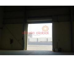 Commercial warehouse with 60,000 sq ft Openland for sale in Dubai Investment park.